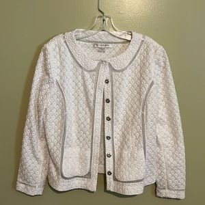 Once worn a couple of times. Beautiful white blazers with snap front.